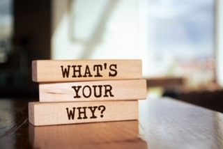 Motivational image with three stacked blocks. The blocks read "what's your why", with one word on each block.