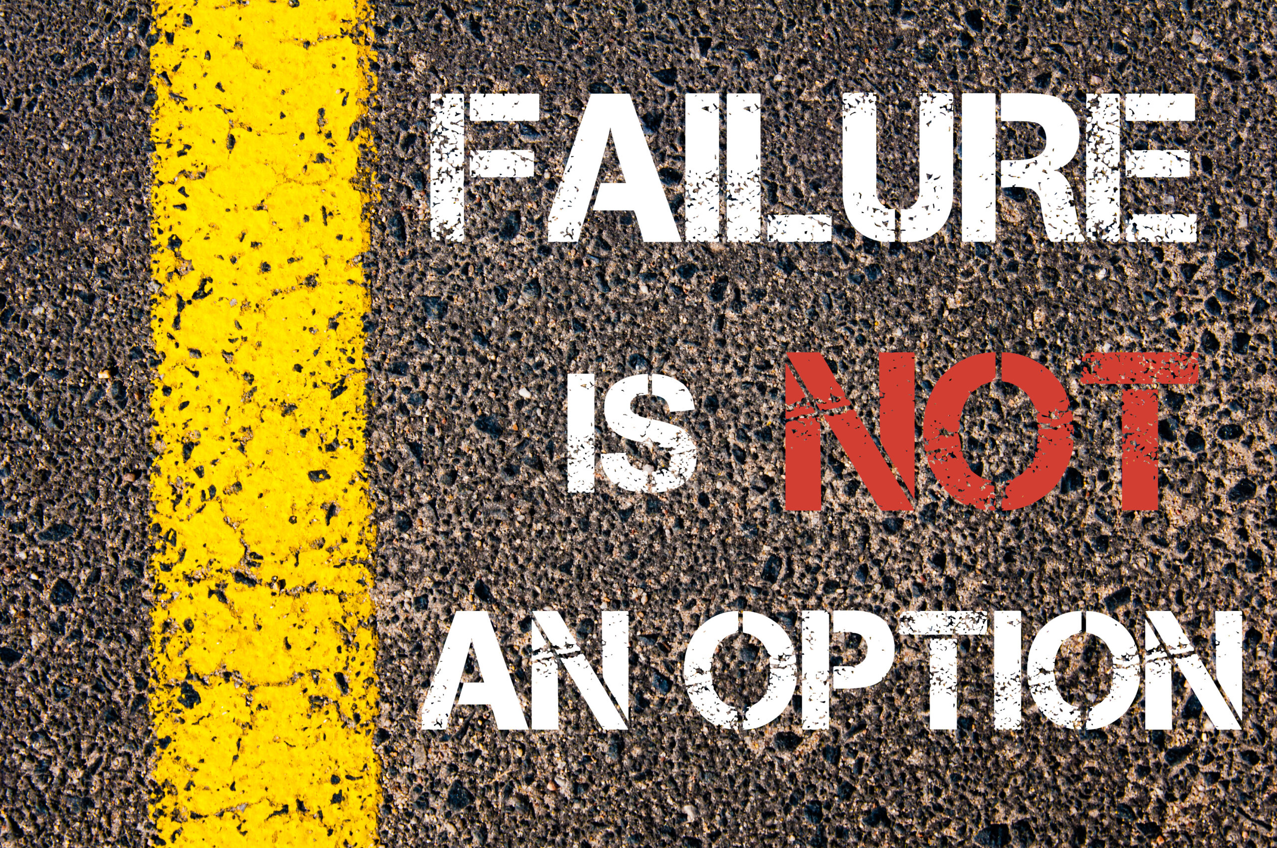 "Failure is not an option" is written in chalk on the street beside a yellow lane line. If you're a failing entrepreneur, that doesn't mean you'll never succeed.