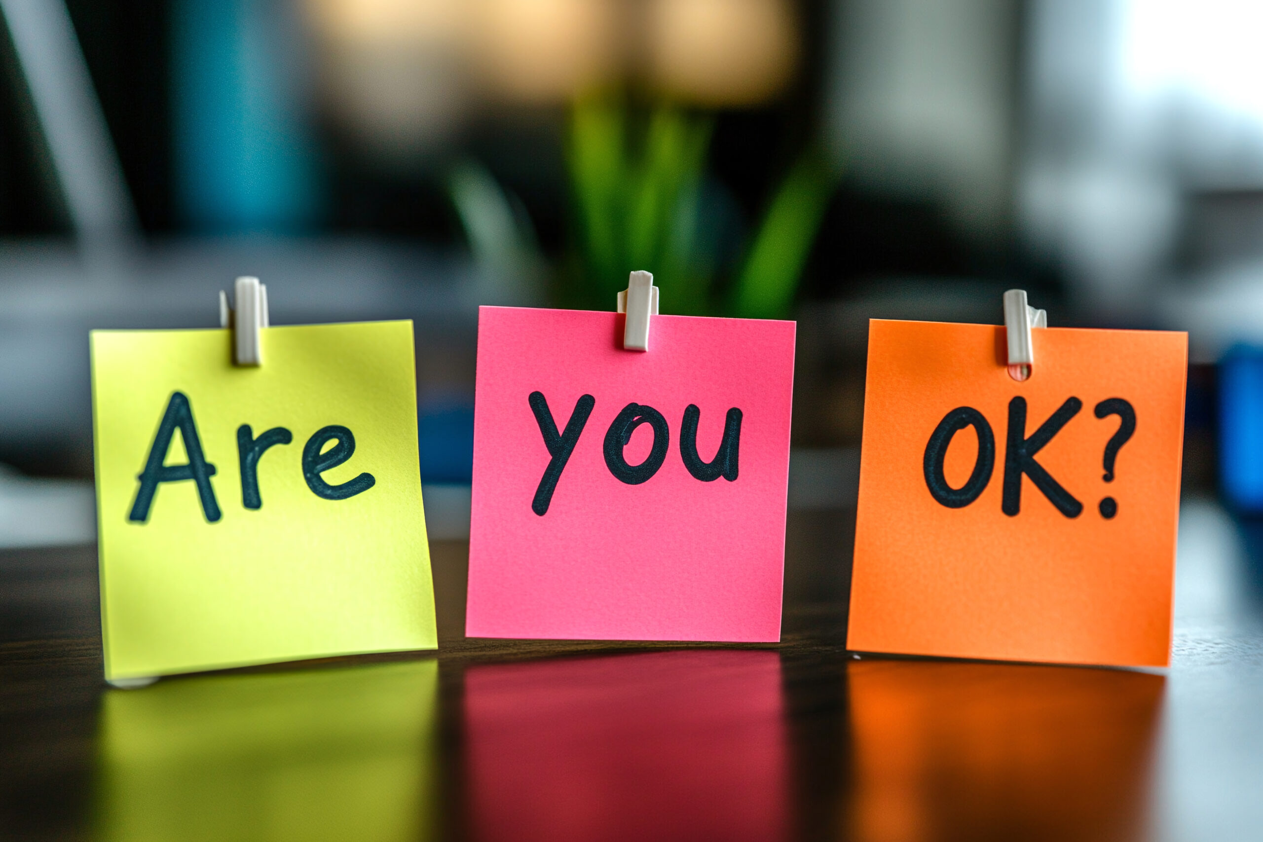 Compassion in Leadership: More Than Kindness blog article. Three post it notes, one stating "Are" another stating "You, and the third stating "OK'
